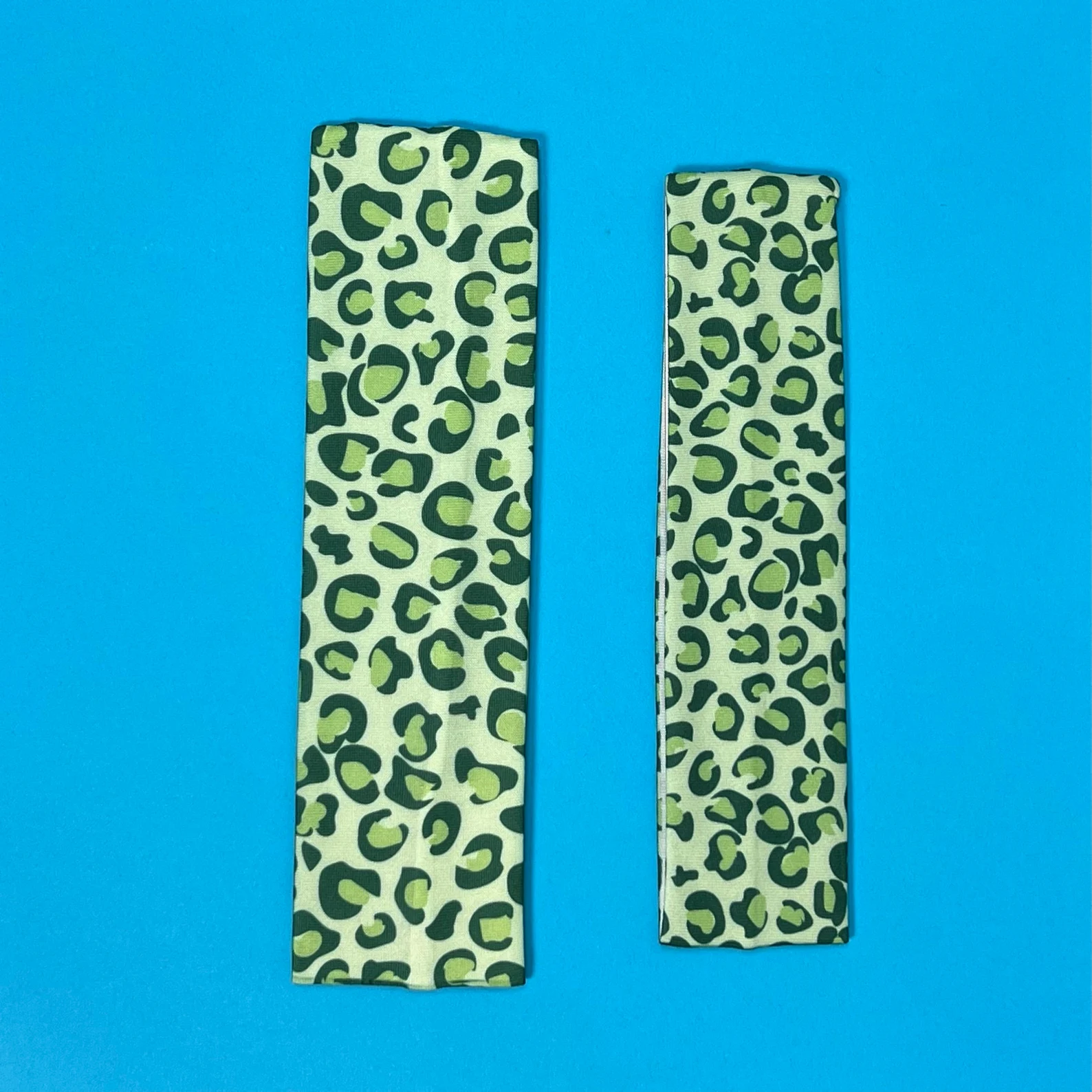 green Custom printed headbands and merchandise for Las Vegas events